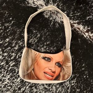 Pamela Anderson purse by Praying